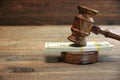 Judges or Auctioneer Gavel And Money On The Wooden Table Royalty Free Stock Photo