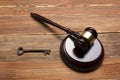 Judges Auctioneer Gavel, Retro Door Key On The Wood Table. Concept For Trial, Bankruptcy, Tax, Mortgage, Auction Royalty Free Stock Photo