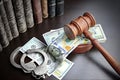 Judges Gavel, Handcuffs, Dollar Cash And Book On Black Table Royalty Free Stock Photo