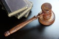 Judges Gavel And Old Book On The Black Wooden Table Royalty Free Stock Photo