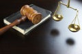 Judges Gavel, Old Book, Scale Of Justice On Black Table Royalty Free Stock Photo