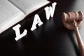 Judges Gavel, Red Book And Sign LAW On Black Table Royalty Free Stock Photo