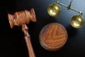 Judges Gavel And Scale Of Justice On The Black Table Royalty Free Stock Photo