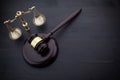 Judges Gavel And Scale Of Justice On The Black Table Background. Law Concept. Royalty Free Stock Photo