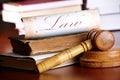 Judges gavel with very old books Royalty Free Stock Photo