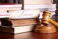 Judges gavel with very old books Royalty Free Stock Photo