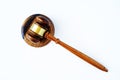 Judges wooden gavel with stand on a white background