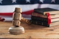 Judges wooden gavel with USA flag in the background. A symbol of jurisdiction. Royalty Free Stock Photo