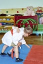 In judogi, small athletes practice fighting techniques