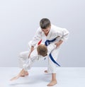 In judogi boys are training throws Royalty Free Stock Photo