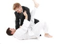 Judoist vs businessman Royalty Free Stock Photo