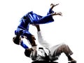 Judokas fighters fighting men silhouettes Royalty Free Stock Photo