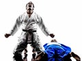 Judokas fighters fighting men silhouettes Royalty Free Stock Photo