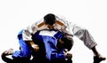 Judokas fighters fighting men silhouettes Royalty Free Stock Photo