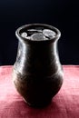 Jug with coins Royalty Free Stock Photo