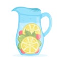 Jug with fresh tasty lemonade. Pitcher with detox citrus drink. Healthy lifestyle.