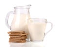 Jug and glass of milk with stack of grain crispbreads isolated on white background Royalty Free Stock Photo