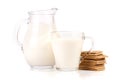 Jug and glass of milk with stack of grain crispbreads isolated on white background Royalty Free Stock Photo