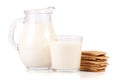 Jug and glass of milk with stack of grain crispbreads on white background Royalty Free Stock Photo