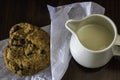 Jug of milk with handmade chocolate cookie