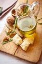 Jug of olive oil, Grana Padano cheese and walnuts Royalty Free Stock Photo