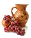 Jug and red grapes Royalty Free Stock Photo