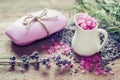 Jug of sea salt, bar of homemade soap and dry lavender flowers. Royalty Free Stock Photo