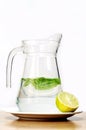 Jug with water, mint and lemon