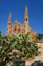 Art Nouveau church in Novelda / Spain with cacti in the foreground Royalty Free Stock Photo