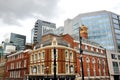 Old and modern architecture in London and a famous pub near Barbican