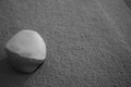 Juggle ball on grey carpet black and white photo Royalty Free Stock Photo