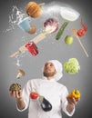 Juggle while cooking Royalty Free Stock Photo