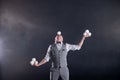 Juggler wearing a suit like a businessman with white balls. concept of success and management Royalty Free Stock Photo