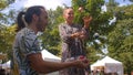 Juggling teacher with balls in city park. Learning to juggle summertime activity Royalty Free Stock Photo