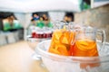 Jugs of fruit lemonade in the ice. Royalty Free Stock Photo