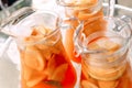 Jugs of fruit lemonade in the ice. Royalty Free Stock Photo