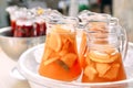 Jugs of fruit lemonade in the ice. Royalty Free Stock Photo