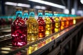 Juice bottles with fruit on a conveyor belt, beverage factory operates a production line, processing and bottling drink