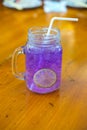 Juice of butterfly pea with lemon and ice in glass Royalty Free Stock Photo