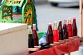 Juice cart in India, selling juice from colorful syrups