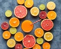 Juice with citrus fruit, grapefruit, orange on blue background. Top view, selective focus. Detox, dieting, clean eating Royalty Free Stock Photo