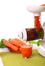 Juice extractor and carrot Royalty Free Stock Photo