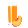 Juice glass and peach fruit segment Royalty Free Stock Photo