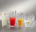 Juice glasses - empty, red juice , white juice and rose juice . Royalty Free Stock Photo