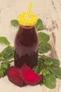 Juice made of beetroot and spinach as source healthy minerals and vitamins. Vintage photo Royalty Free Stock Photo