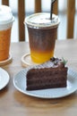 Orange juice and espresso or black orange coffee and cake