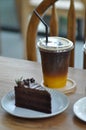 Juice, orange juice and espresso or black orange coffee and cake