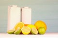 Juice pack with citrus extracts. Selective focus. Fresh juice package with lemon lime and orange