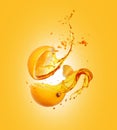 Juice splashes out from sliced orange on a yellow background Royalty Free Stock Photo