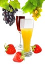Juice, wine and berries closeup Royalty Free Stock Photo